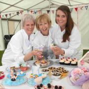 TREATS: Jo Wheatley, winner of the 2011 Great British Bake-off, joins fellow judges Jenny Budzynski and Mary Reader in judging the entries in the baking competition