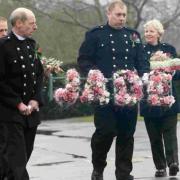 Firefighters with a wreath