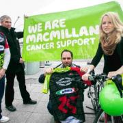Louis Reeves and partner Gemma Russell, who are taking part in the 2013 Macmillan Dorset Bike Ride, together with fundraiser Bill Riddle, left, volunteer Peter Smith-Nicholls, and right, Chrissie Watchan-Neal, area manager of Macmillan Dorset