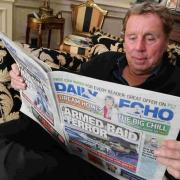 READING UP: Harry catches up with the news in the Echo