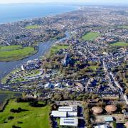 Aerial view of Christchurch with Bournemouth and Poole in the distance. Picture: Stephen Bath