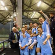 TROPHY TIME: Poole Town lift the Dorset Senior Cup after their 5-0 victory against Wimborne Town (Picture: Andy Orman)