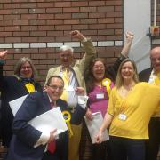 Liberal democrat candidates celebrating the result of the local elections 2019