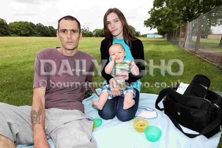 Rubbish left behind after travellers move on from Duck Lane playing fields in Bournemouth. Local residents Leanne Byrne, Chris Robertson and baby Ethan, who regularly visit the site to picnic.