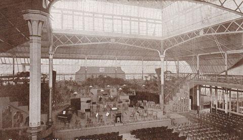 Old postcard of the inside of the old glass Winter Gardens in Bournemouth. The orchestra laid out on the stage could be the Bournemouth Municipal Orchestra (BSO). Submitted by G Gulliver