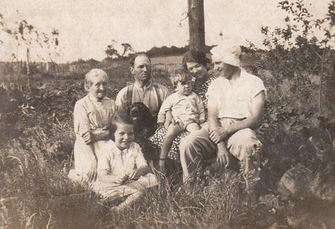 The Kentell family relax in fields near Berry Hill, 1932