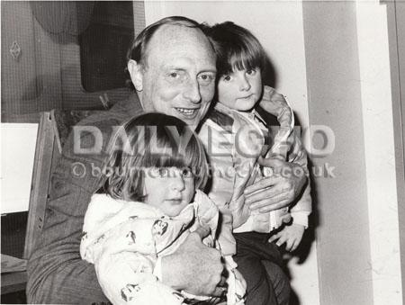 Labour leader Neil Kinnock visited patients and staff in the children's and orthopaedic wards of Poole Hospital. He is pictured with Tina Entwistle,4, and her brother Sean, 5 from Waterloo, Poole. April 1985. 