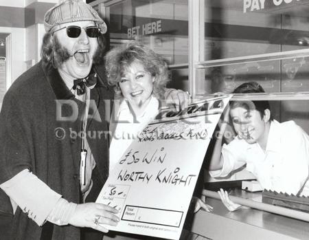 October 1988 Channel Four racing commentator John McCririck opened the new Coral betting shop in Southbourne, Bournemouth. He is seen here with manager Debbie Hollick and cashier Claire Hicks.

