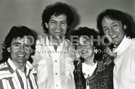 The Monkees ( l-r) Davy Jones, Micky Dolenz and Peter Tork met fan Ann Robertson after  their show at BIC.  Picture by Hattie Miles, 1989.