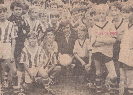 In 1970 John Bond, Bournemouth and Boscombe FC manager attended a game betweenSandford School players,on the left, and Wareham Junior School, right. The match marked the opening of Sandford Primary School sports field, and raised a collection for the foot