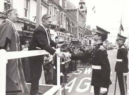 In 1978 a young soldier from Bovington Junior Leaders Regiment RAC presented a regimental Shield to the Mayor of Conches M. Chateau, watched by the Mayor Charles Patterson, when Wareham twinned with the Normandy town.