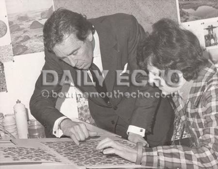 In November 1974 the photographer Lord Snowdon, in his capacity as honorary adviser to the Design Council visited the Sanderson and Shand Kydd wallpaper 'mill' at Christchurch. He is seen here with worker admiring a design by Miss Valerie Gough.