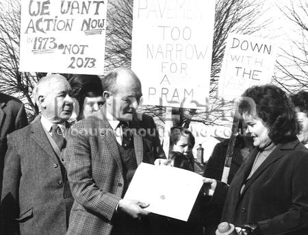 In 1973 a  petition to make Leigh Arch in Leigh Road, Wimborne safe for pedestrians was handed to North Dorset MP David James by campaigner Mrs Winifred White. The narrow arch carried heavy traffic along the A31.
