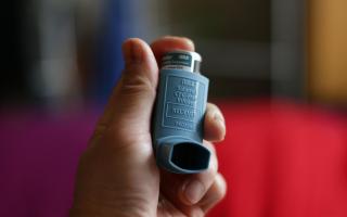 A person holding an Ivax Reliever inhaler for the treatment of asthma, as rising pollen levels this weekend could leave people with asthma at risk of life-threatening asthma attack. Credit: PA