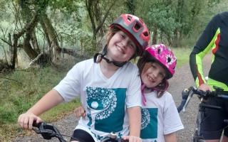 : Sisters Macy and Pippa get on their bikes for Forest Holme Hospice Charity