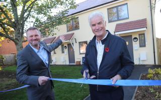 NEW LEADERSHIP: Cllr Lawton at the opening of three energy efficient homes with ex-housing director Gary Josey