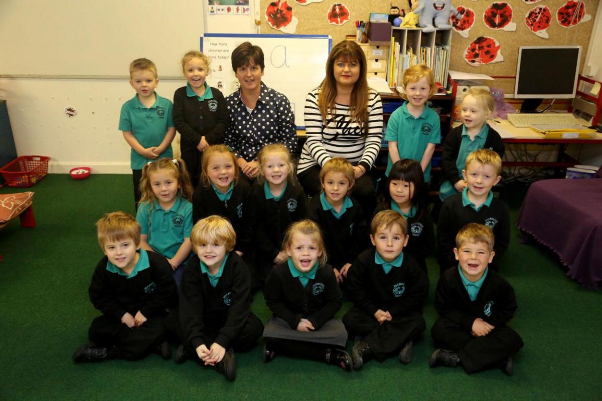 Reception class pupils at Hillbourne School and Nursery in Poole with teacher Amanda Belbin and TA Jacquie Pickford.