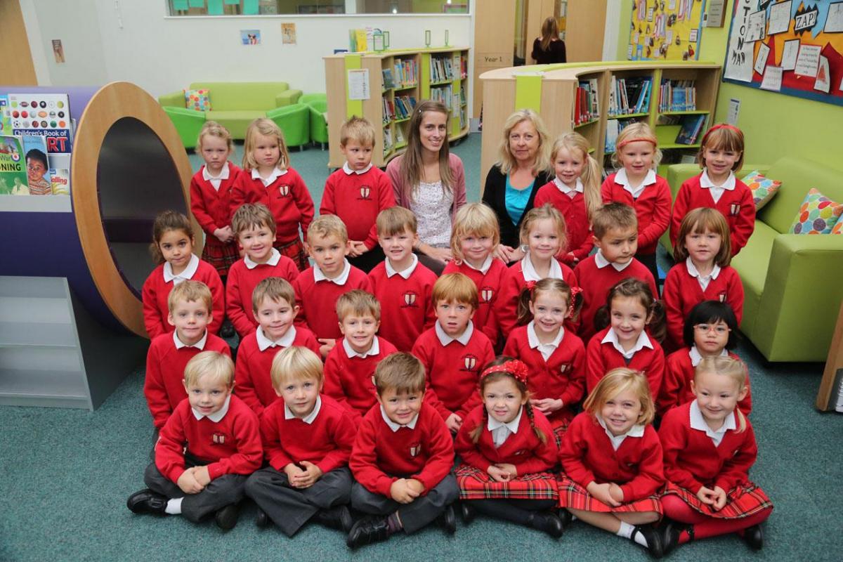 Reception class pupils at Lilliput Infants School with teacher Sarah Meaker and TA Angela Ritchie.
