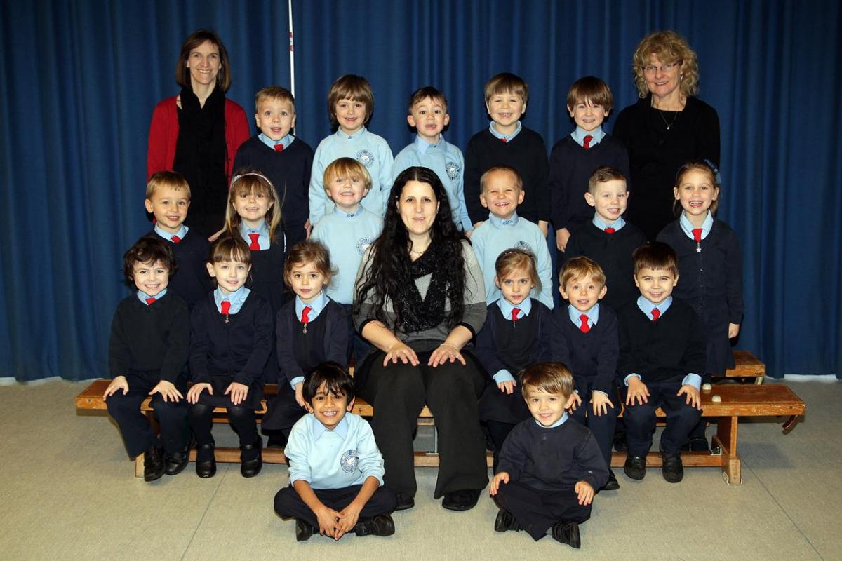 Reception class at St Catherine's Primary School. Pictured are teacher Fran Montgomery, centre, TA Mary Wickens, right and student teacher Jennifer Hilton.