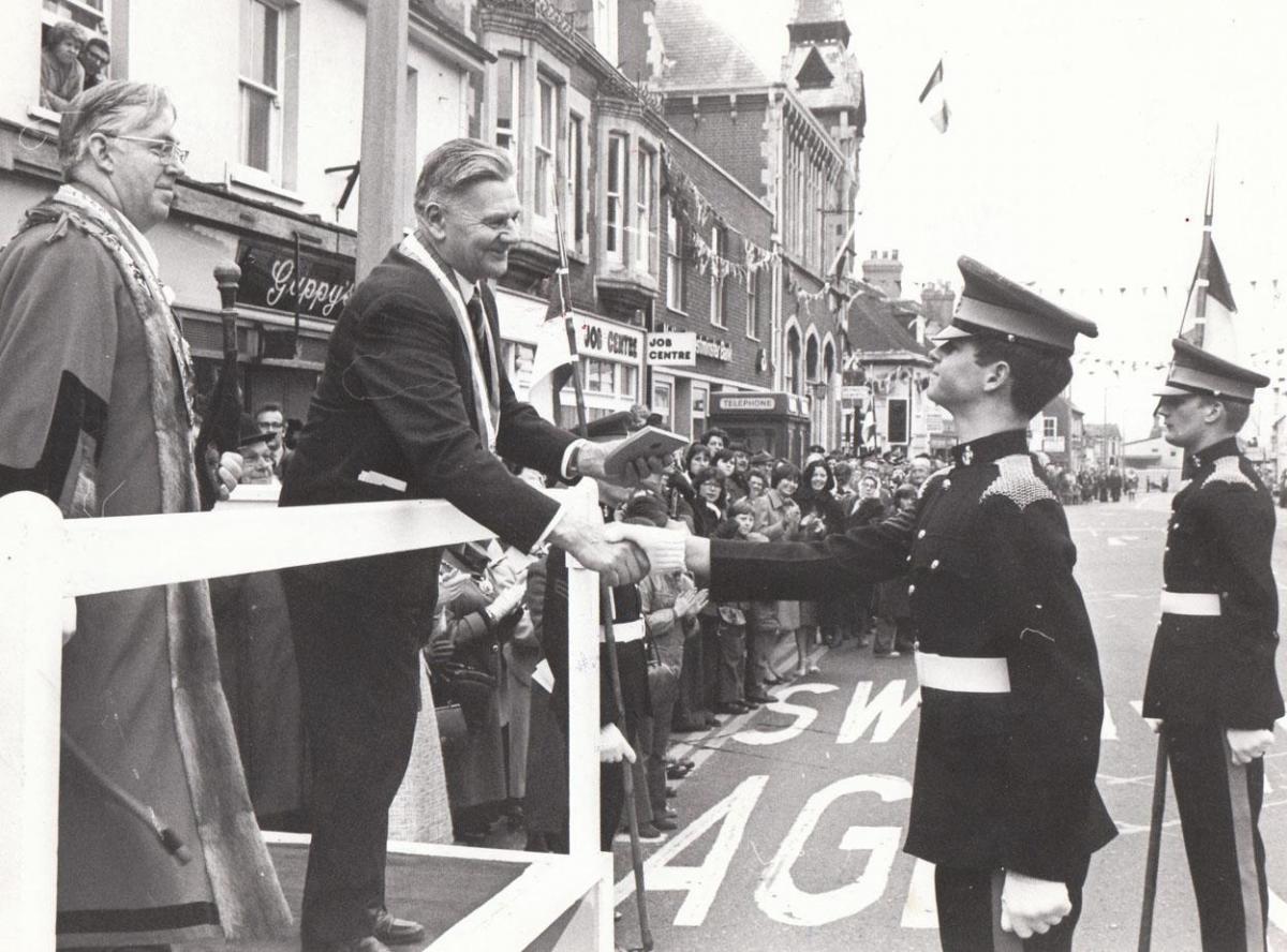 In 1978, a young soldier from Bovington Junior Leaders Regiment RAC presented a regimental Shield to the Mayor of Conches M. Chateau, watched by the Mayor Charles Patterson, when Wareham twinned with the Normandy town.