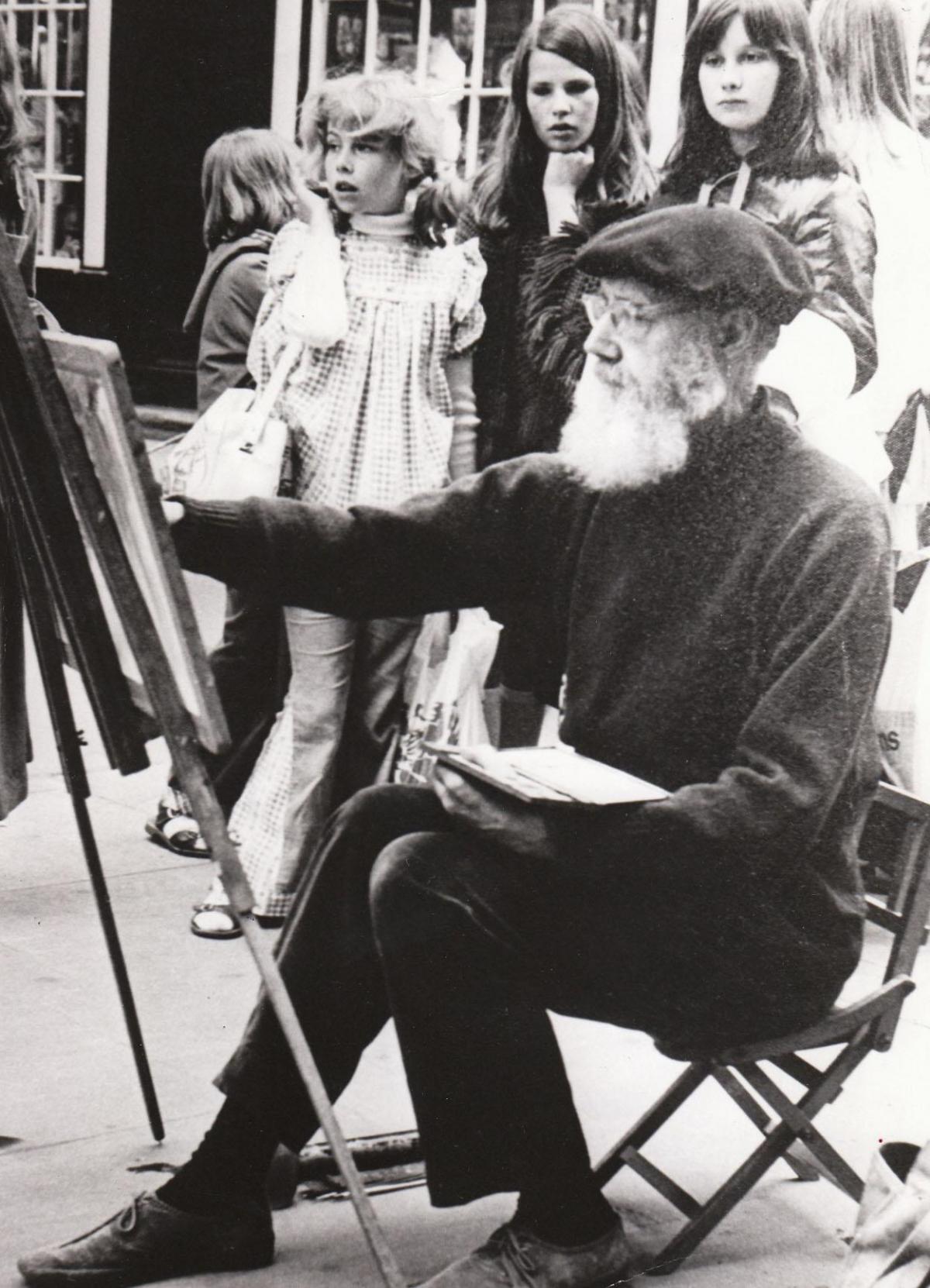 In 1976, 74-year-old artist Robert Russell, who had a studio in Swanage High Street often drew an audience from curious passers-by.