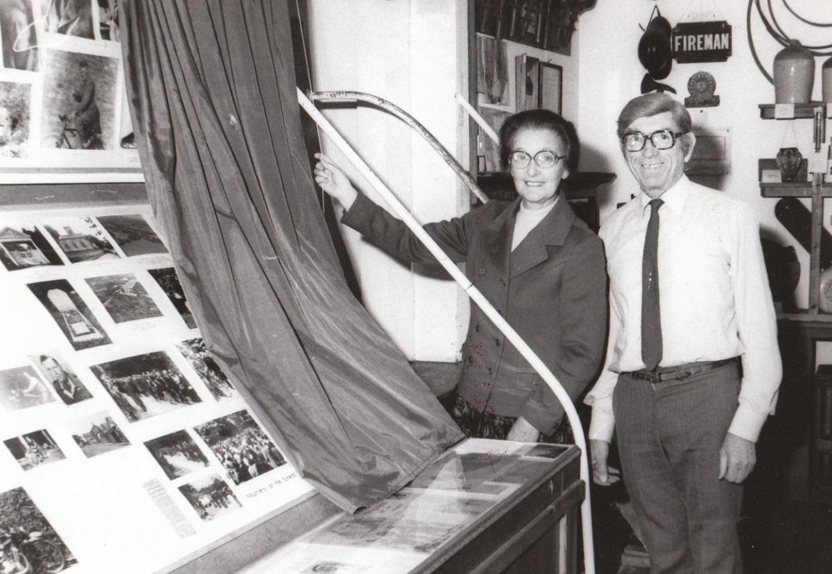 In 1982, Wareham Museum curators Lorna and Maurice Pascall pull the curtains on St John's Hill premises as the museum moves to East Street. Picture: Arthur Grant