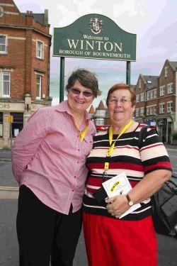 AUSSIES IN TOWN: Gail and Marion standing by the Welcome to Winton' sign in Bournemouth