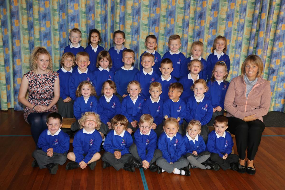 Reception children at Heatherlands Primary School in Parkstone with teacher Ella Summers, left, and TA Anne Ray.