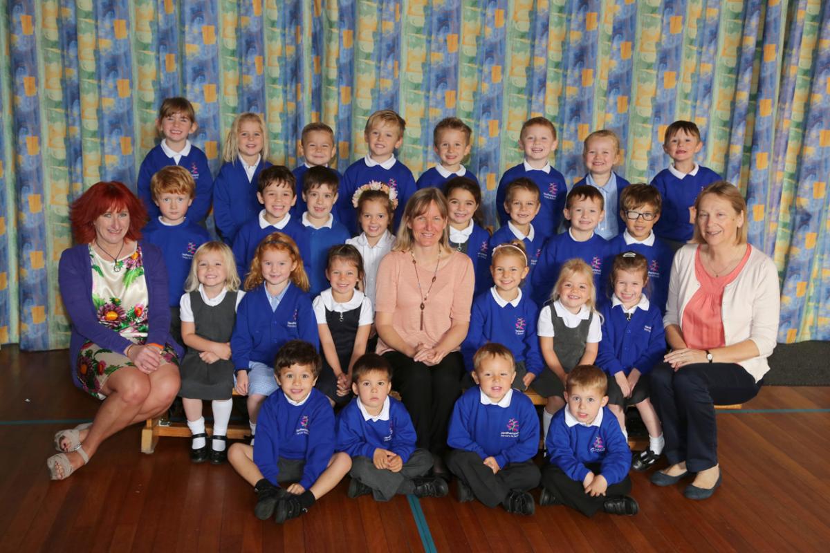 Reception children at Heatherlands Primary School in Parkstone with teacher Sarah Plumb, centre, and TA's Helen Marsh, left and Diane Treasure.