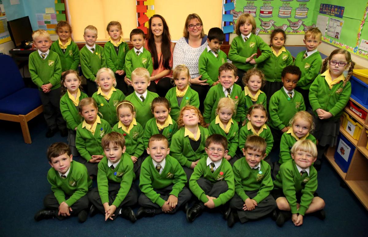 Reception pupils at The Epiphany School with
TA Melissa Ward and teacher Vicky Goode.