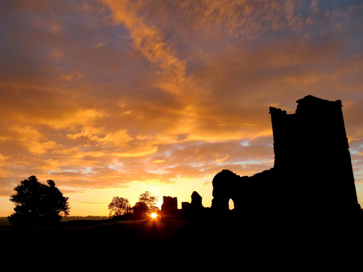 Sunrise at Knowlton Church, north of Wimborne taken by Simon Gregory
