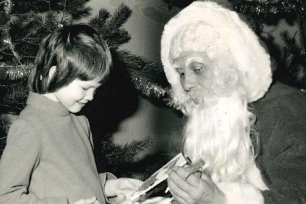 Kirsty McGeachie, five, was delighted to meet Father Christmas at the Sandford Parent-Teachers Association Christmas bazaar in 1974. Photographer Arthur Grant took her picture.