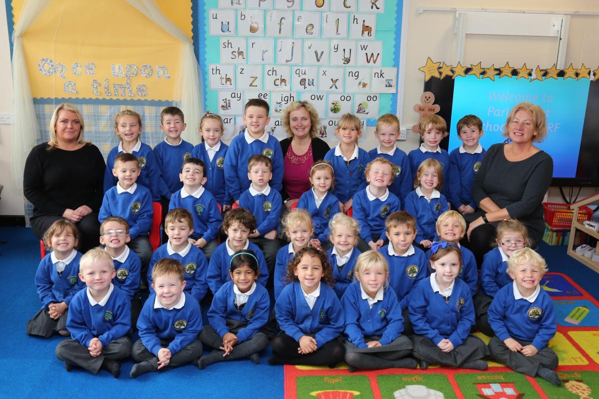 Reception children in Class RF at Parley First School with teacher Jenni French, centre, and TA's Emma Stewart and Jane Rawlings