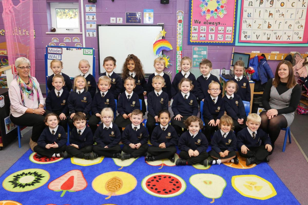 Reception children at Manorside Academy with teacher Andra Lock, right, and TA Jan Moorley
