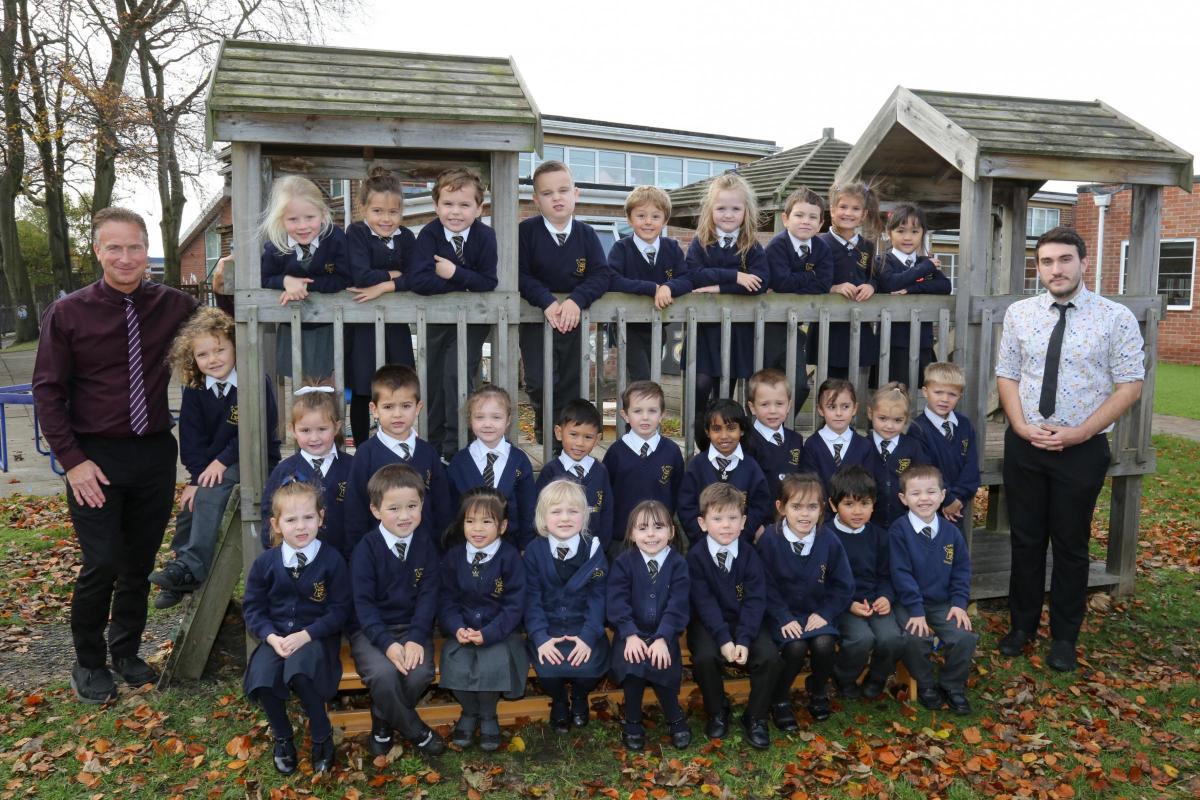 Reception children in Hedgehogs 2 class at St Joseph's Catholic Primary school with teacher Daniel Carter, right, and TA Paul Cadby