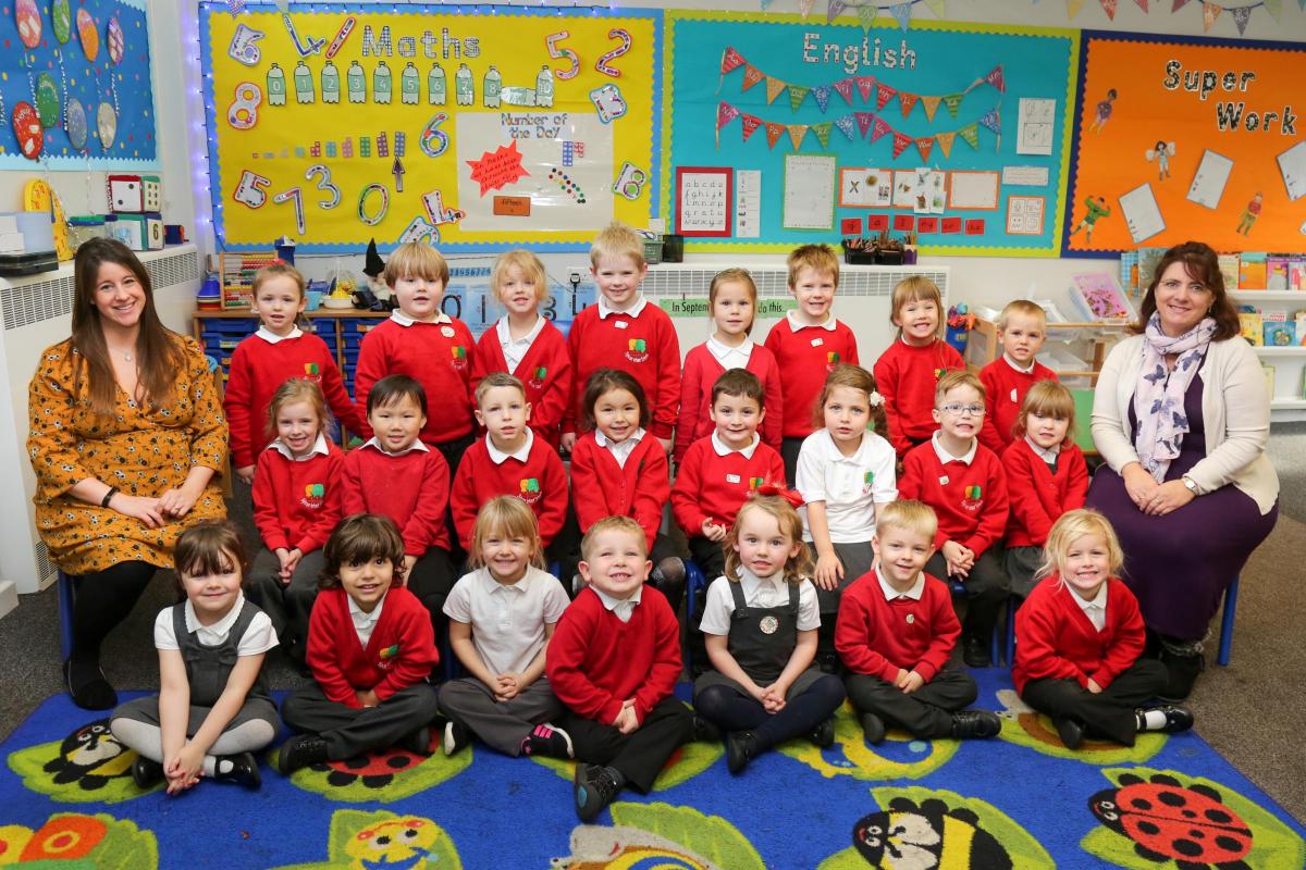 Reception children in Chestnut class at Sylvan Infant School in Poole with teacher Kirsty Hodgman and TA Andrea Hicks.