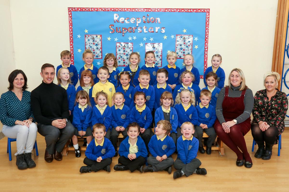 Reception children in Seahorses class at Twin Sails Infant school in Hamworthy with teacher Alex Hurst, 2nd left, and TA's Patrycja Stachowicz, Louise Thompson and Hayley Whitbread