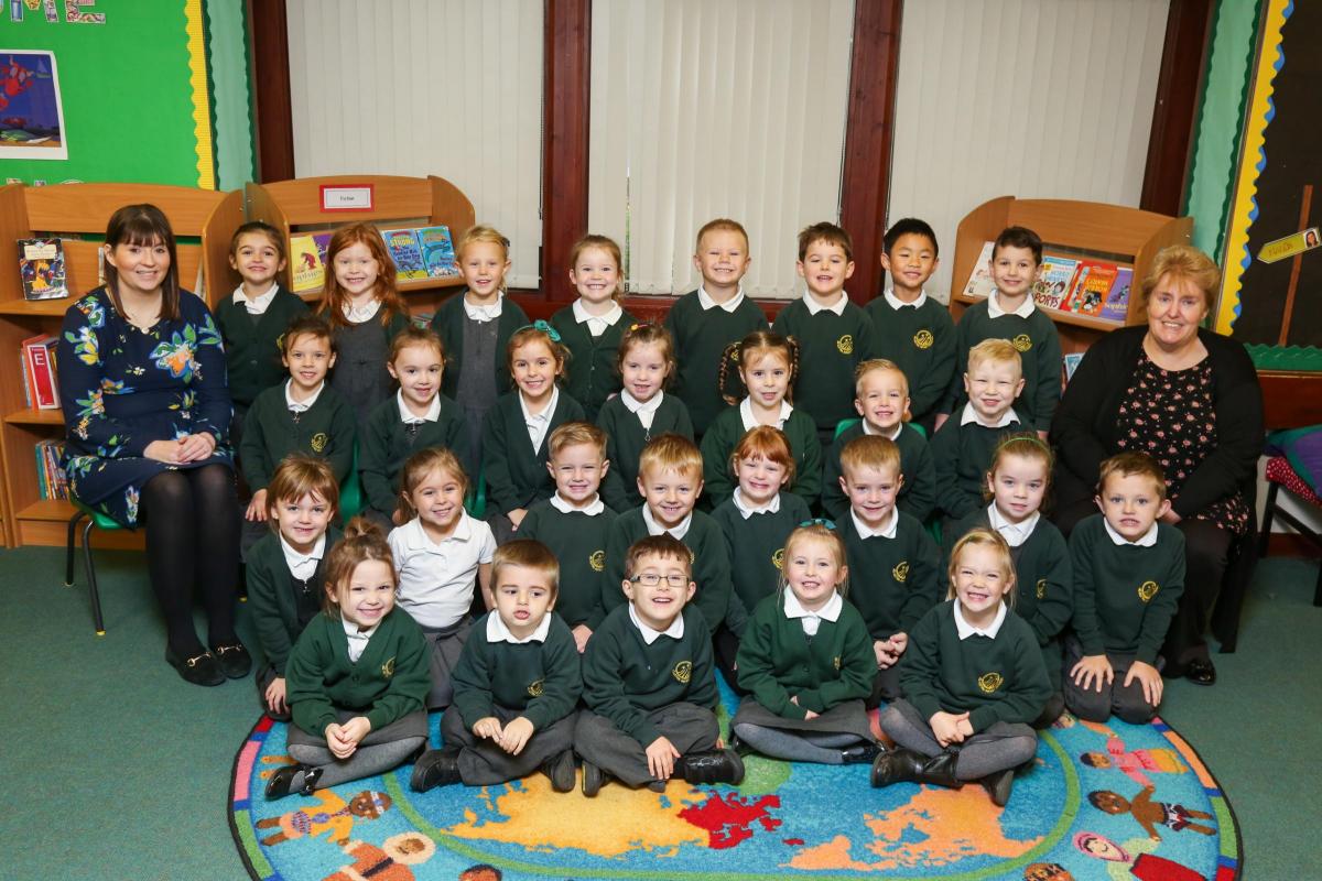 Reception children in Stars class at Ad Astra Infant school with teacher Miss Day and TA Mrs Steinwaltz.