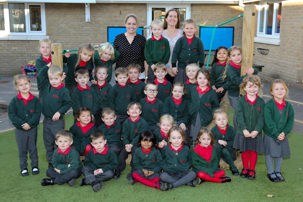 Reception children in Bluebells class at Broadstone First School with teacher Fiona Lord and LSA Louise Harper