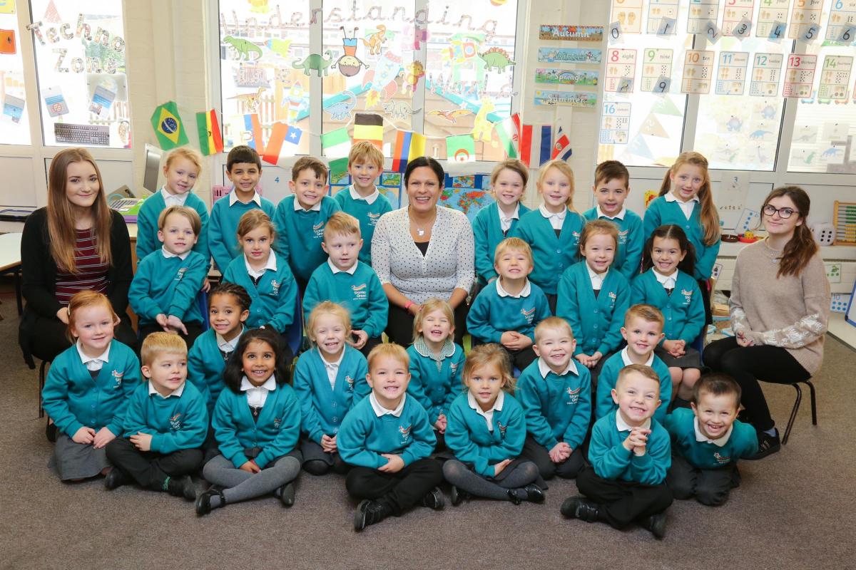 Reception children in Catterpillars class at Stanley Green Infant Academy  with teacher Liz Trimby and TA's Chloe Webb and Tiffany Watts