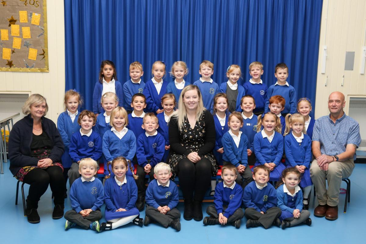 Reception children in Robins class at Springdale First School in Broadstone with teacher Alice Rist, centre, and TA's Rhona Smith and Ken Wiffen
