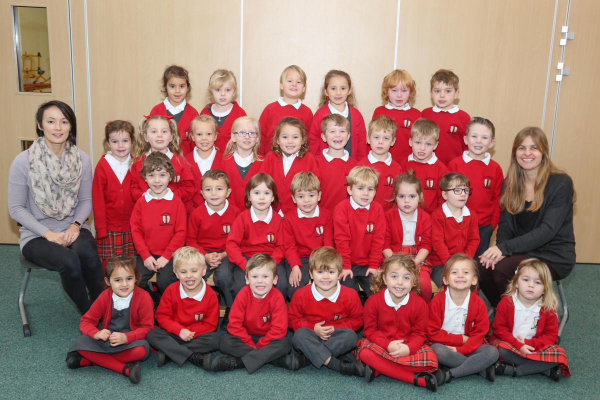 Reception children in Bumblebees class at Lilliput C of E Infant School with teacher Amy Dent and TA Zoe Milne.