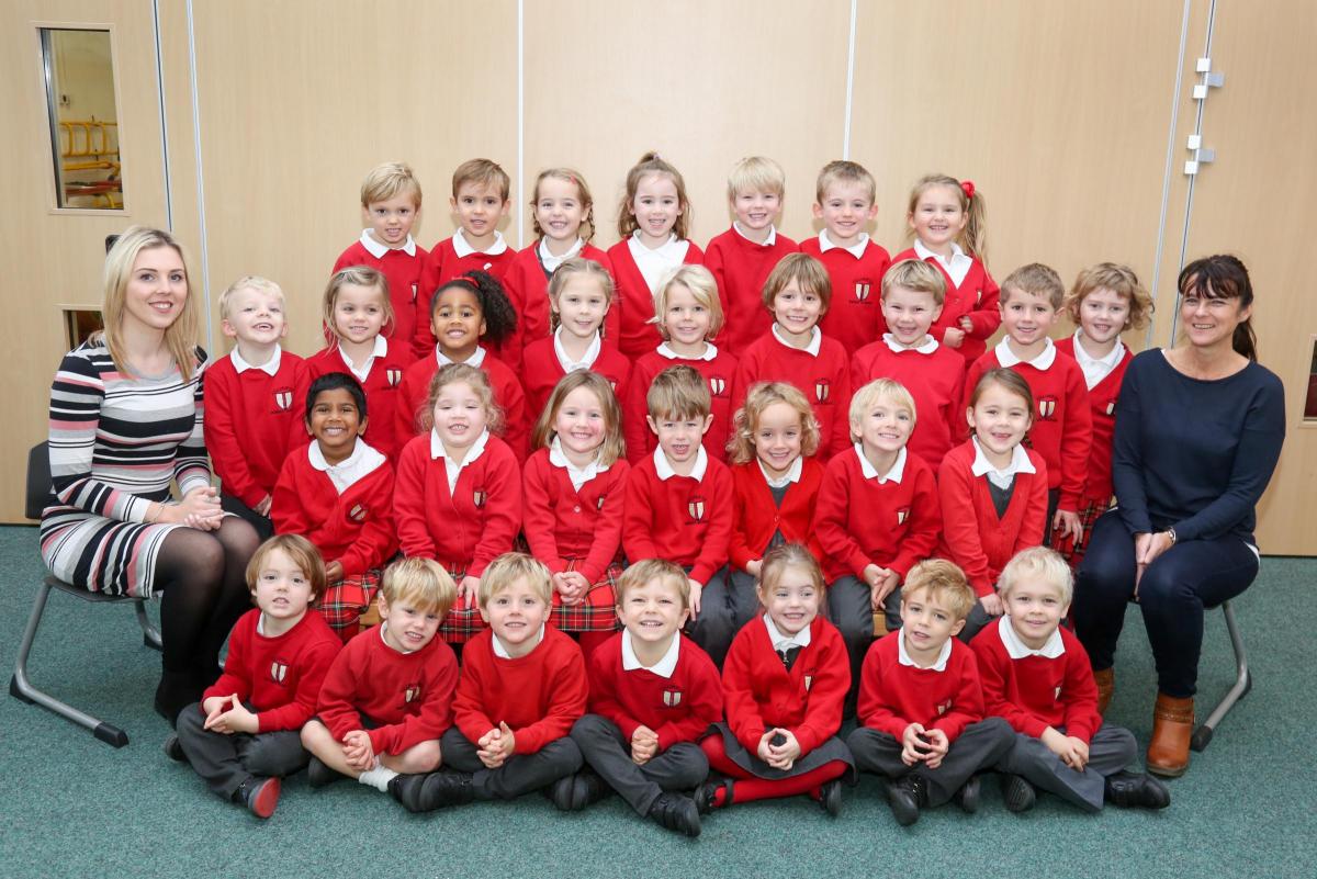 Reception children in Ladybirds class at Lilliput C of E Infant School with teacher Hannah Adeney and TA Debbie Roberts.