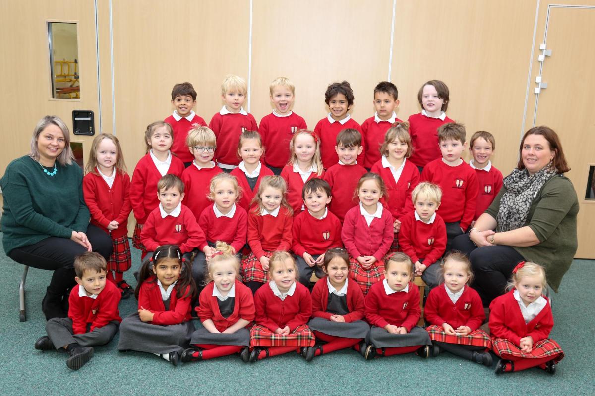 Reception children in Caterpillars class at Lilliput C of E Infant School with teacher Kelly Smith and TA Anne Gregory.