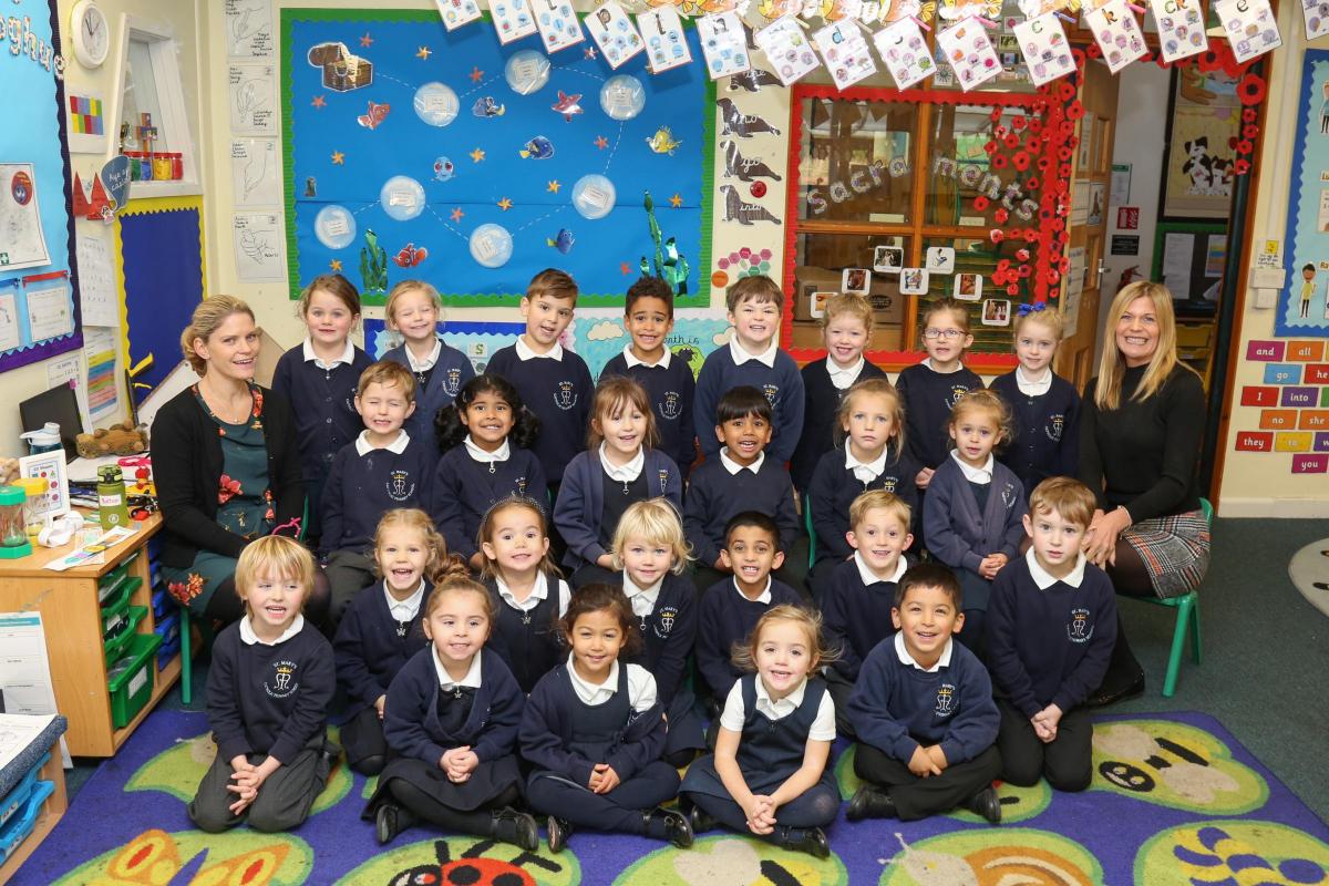 Reception children at St Mary's Catholic Primary school in Poole with teacher Lucy Eddy and TA Mandy Johnson.