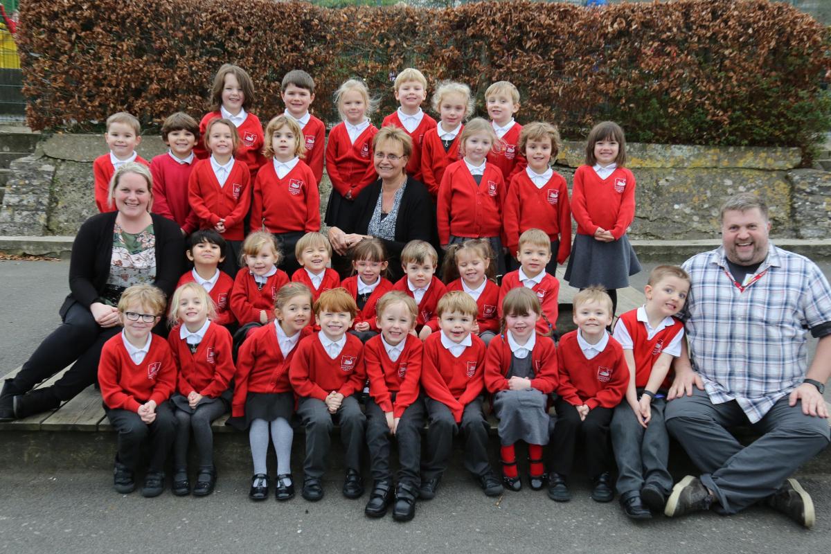 Reception children at Swanage Primary School with teacher Liz Hill, centre, and TA's Julia Croucher and Tom McHenry.