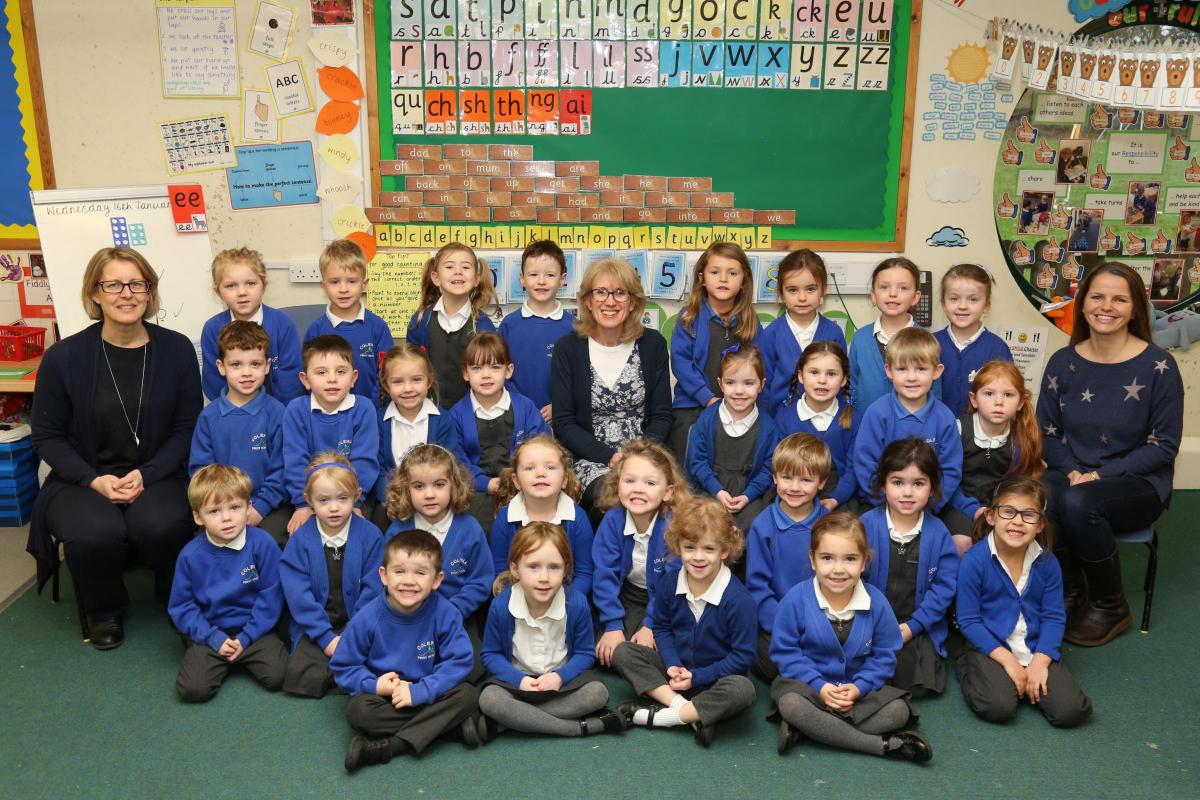 Reception children at Beaucroft Foundation School in Colehill with TA Ali King and teacher Laura Dyer.
