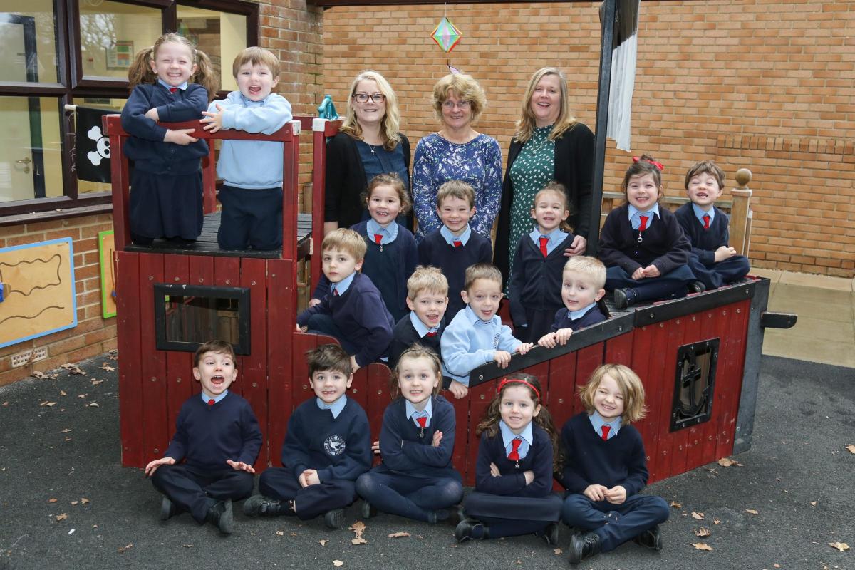 Reception children at St Catherine's RC Primary School in Colehill with teachers Sarah Williams and Caroline Beale and TA Mary Wickens, centre.