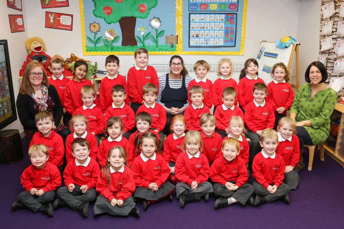 Reception children in Oak class at Rushcombe First school in Corfe Mullen with teacher Miss Maese, centre, and TA's Mrs Kirtland and Mrs Colomb.