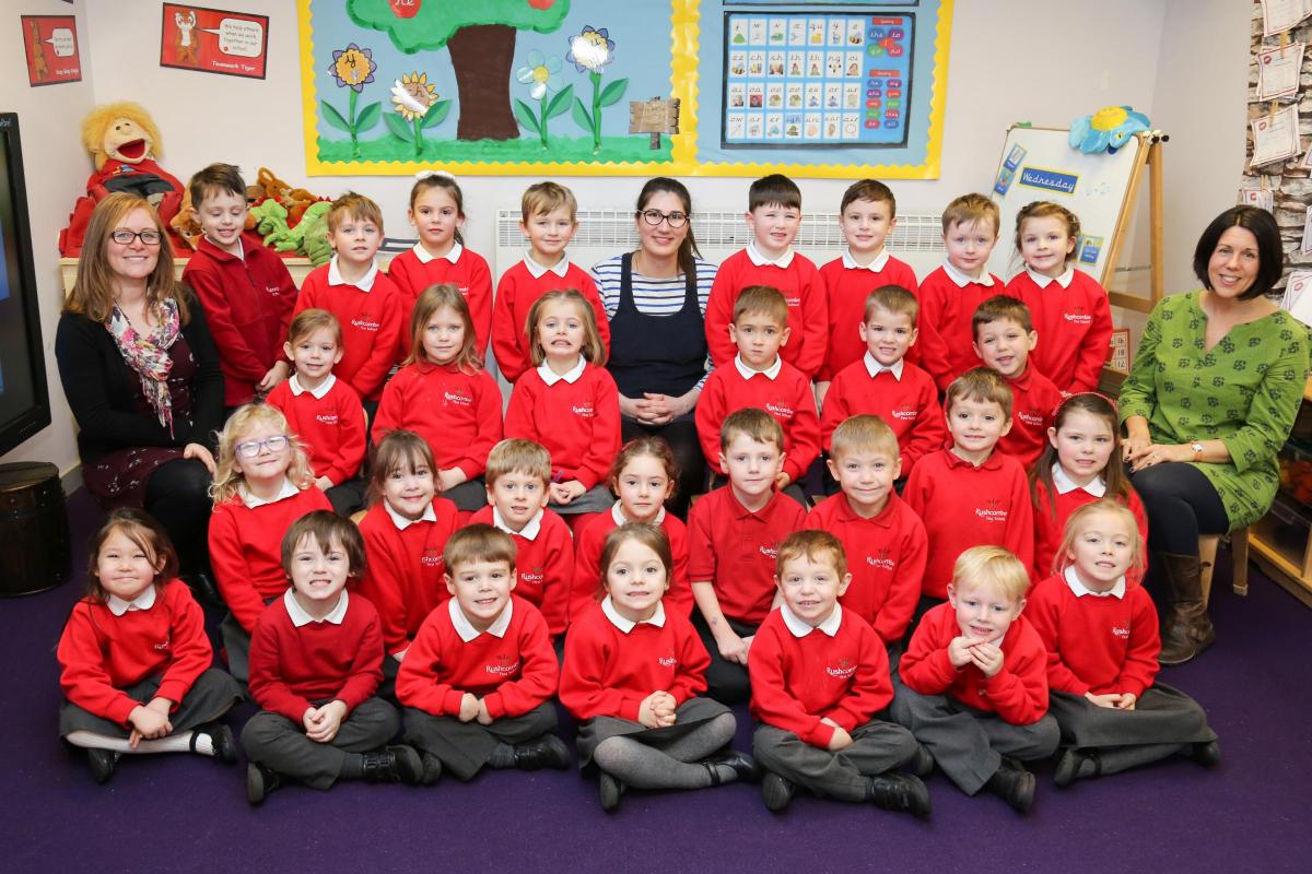 Reception children in Ash class at Rushcombe First school in Corfe Mullen with teacher Miss Maese, centre, and TA's Mrs Kirtland and Mrs Colomb.